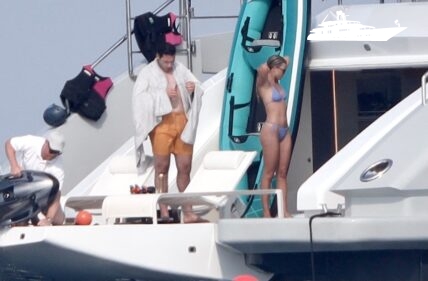 Sofia Richie and Elliot Grainge are seen rinsing off on the back of their luxury yacht after playing around in the ocean in St Tropez.