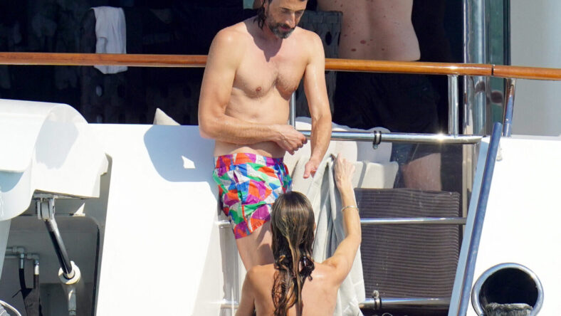 Adrien Brody and Georgina Chapman on a yacht with Natasha Poly during holidays in St-Tropez. 19 Jul 2022 Pictured: Adrien Brody and Georgina Chapman. Photo credit: EliotPress / MEGA TheMegaAgency.com +1 888 505 6342 (Mega Agency TagID: MEGA879387_023.jpg) [Photo via Mega Agency]