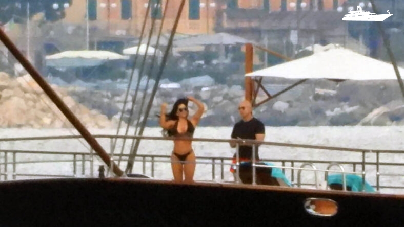 Jeff Bezos is seen taking photos of Lauren Sanchez on their yacht, while at anchor in Portofino